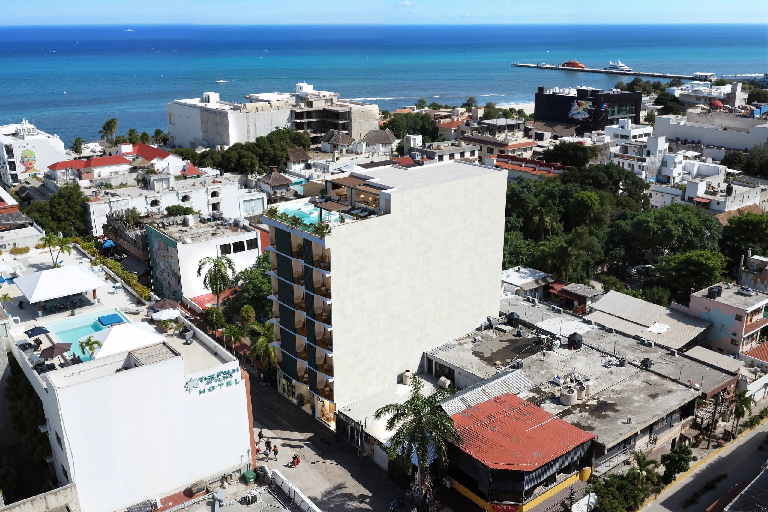 Vista aérea de la ubicación de Petrus Condos cerca del mar